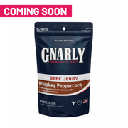 Front of a 2.5 oz bag of Gnarly Jerky Whiskey Peppercorn beef jerky, with a Coming Soon banner